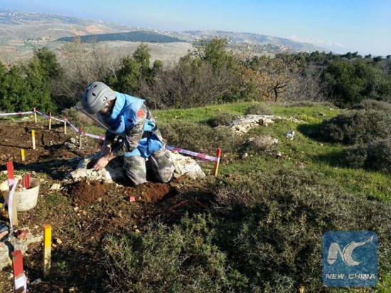 A Chinese peacekeeper in the UN Interim Force in Lebanon (UNIFIL) was searching for idle mines scattered along the UN Blue Line between Israel and Lebanon on Feb. 5, 2018. (Xinhua)  YAROUN, Lebanon, Feb. 11 (Xinhua) 