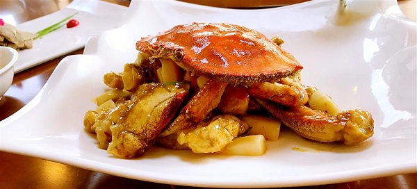 Gazami crab and rice cake stir-fry. (Ti Gong)