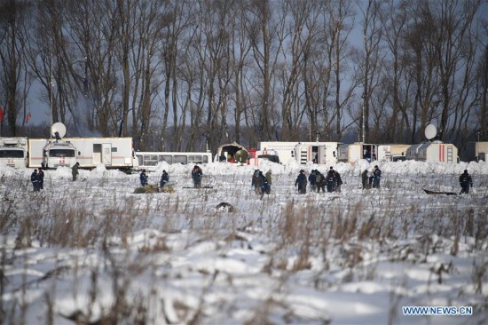Russian Emergencies Ministry officers work at the scene where the AN-148 passenger jet crashed on Feb. 11 in the Moscow region of Russia on Feb. 12, 2018. (Xinhua/Sputnik)