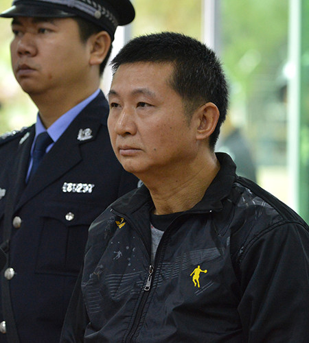 Chen Man attends court in Hainan province when his case was retried in February 2016. His conviction was later quashed. (Photo/Xinhua)
