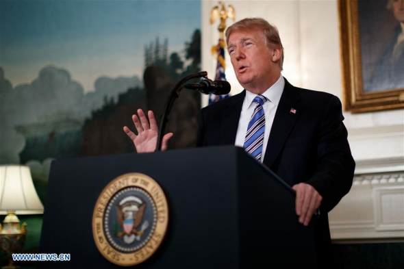 U.S. President Donald Trump speaks in a national address regarding the mass shooting in Parkland, Florida, at the White House in Washington D.C., the United States, on Feb. 15, 2018. Donald Trump said here on Thursday that he is making plan to visit shooting scene in Parkland, Florida. (Xinhua/Ting Shen)