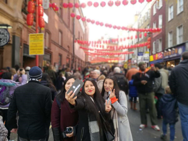 Visitors enjoy festival atomsphere at Chinatown during Spring Festival celebration. Photo provided to China Daily