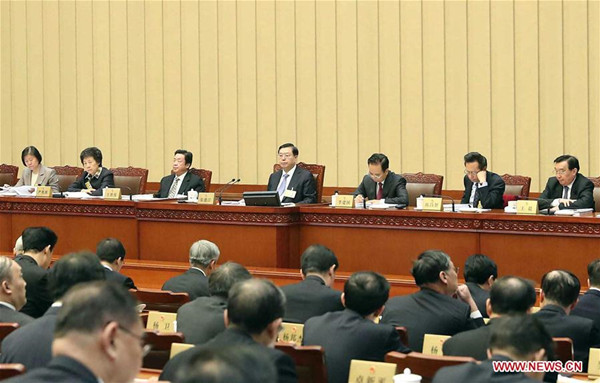 Zhang Dejiang (C, rear), chairman of the Standing Committee of China's National People's Congress (NPC), presides over the opening meeting of the 33rd session of the 12th NPC Standing Committee in Beijing, capital of China, Feb. 23, 2018. (Xinhua/Liu Weibing)