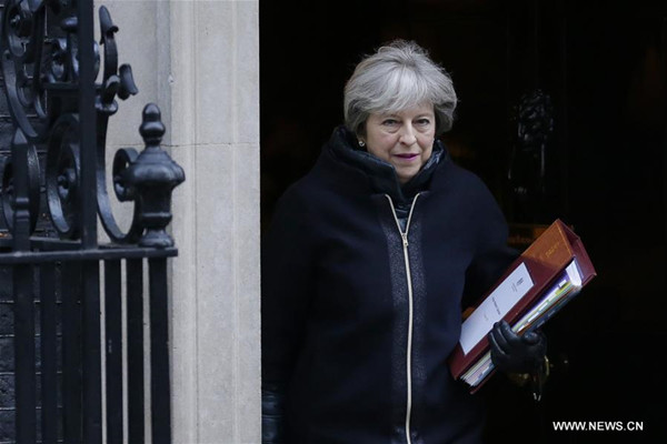 British Prime Minister Theresa May leaves 10 Downing Street for Prime Minster's Questions at the House of Commons, in London, Britain, on Jan. 17, 2018. (Xinhua/Tim Ireland)