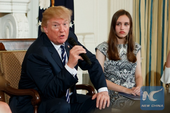 U.S. President Donald Trump(L) speaks during a listening session on school safety at the White House in Washington D.C., the United States on Feb 21, 2018. U.S. (Xinhua/Ting Shen)