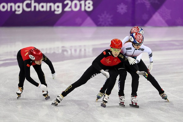 China's Fan Kexin was called for impeding South Korea's Choi Min-jeong in the women's 3,000m relay on Tuesday. China and Canada were both disqualified after crossing the finish line second and third. (Feng Yongbin/China Daily)