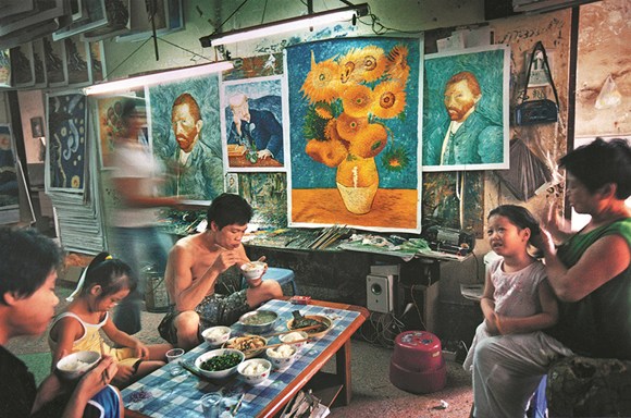 The documentary film China's Van Goghs tells the story of Zhao Xiaoyong (center), who is among skilled painters in a village in Shenzhen, Guangdong province, who are known for making perfect replicas of Western works of art. (YU HAIBO / FOR CHINA DAILY)