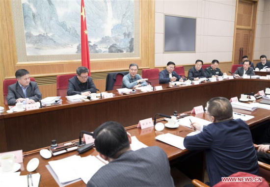 Chinese Vice Premier Wang Yang (3rd rear), also a member of the Standing Committee of the Political Bureau of the Communist Party of China Central Committee and head of the State Council Leading Group of Poverty Alleviation and Development, presides over a plenary meeting of the leading group in Beijing, capital of China, Feb. 23, 2018. (Xinhua/Wang Ye)