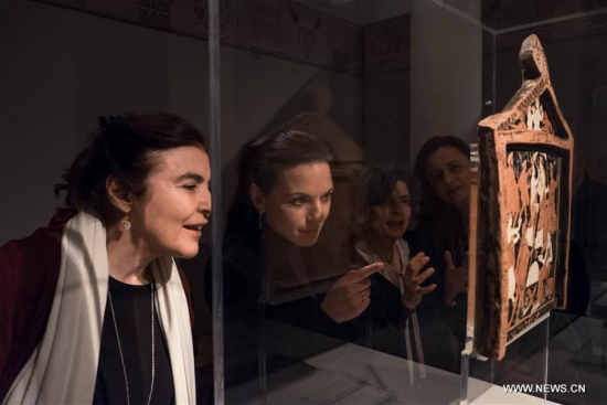 Greek Minister of Culture Lydia Koniordou (1st L) visits the temporary exhibition Eleusis, The great mysteries at the Acropolis Museum in Athens, Greece, on Feb. 25, 2018. (Xinhua/Lefteris Partsalis)