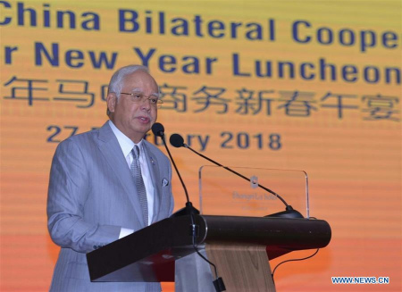 Malaysian Prime Minister Najib Razak speaks during a luncheon in celebration of the Chinese New Year, which was organized by Malaysia-China Business Council, of which he is a patron, on Feb. 27, 2018.(Xinhua)