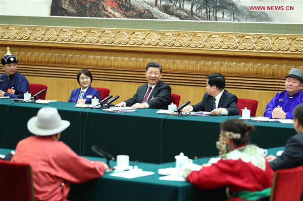 Chinese President Xi Jinping, also general secretary of the Communist Party of China (CPC) Central Committee and chairman of the Central Military Commission, joins a panel discussion with the deputies from Inner Mongolia Autonomous Region at the first session of the 13th National People's Congress in Beijing, capital of China, March 5, 2018. (Xinhua/Xie Huanchi)