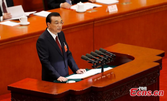 Premier Li Keqiang delivers the government work report at the first session of the 13th National People's Congress at the Great Hall of the People in Beijing, March 5, 2018. (Photo: China News Service/Du Yang)