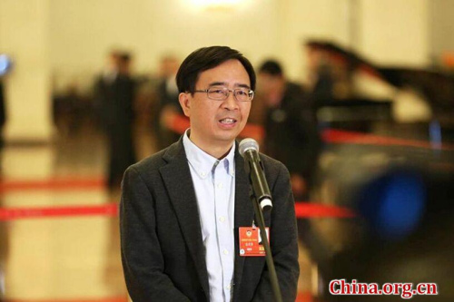 Pan Jianwei, member of the 13th National Committee of the Chinese People's Political Consultative Conference (CPPCC), takes an interview on March 3, 2018, ahead of the opening of the first session of the 13th CPPCC National Committee at the Great Hall of the People in China's capital, Beijing. (Photo/China.org.cn)