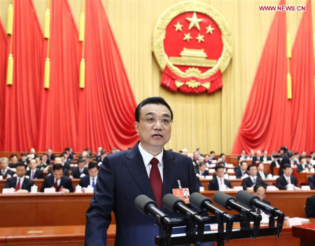 Chinese Premier Li Keqiang delivers a government work report at the opening meeting of the first session of the 13th National People's Congress at the Great Hall of the People in Beijing, capital of China, March 5, 2018. (Xinhua/Ju Peng)