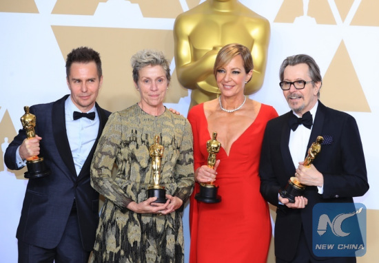 Oscar winners Sam Rockwell, Francis McDormand, Allison Janney and Gary Oldman (L to R) pose at press room of the 90th Academy Awards at the Dolby Theater in Los Angeles, the United States, on March 4, 2018. (Xinhua/Li Ying)