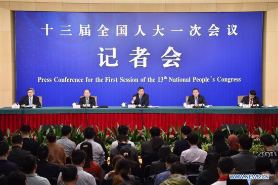 Head of the National Development and Reform Commission (NDRC) He Lifeng (C), deputy heads of the NDRC Zhang Yong (2nd R) and Ning Jizhe (2nd L) take questions during a press conference on innovation and improvement of macro-economic control and promotion of high quality development for the first session of the 13th National People's Congress in Beijing, capital of China, March 6, 2018. (Xinhua/Li Xin)