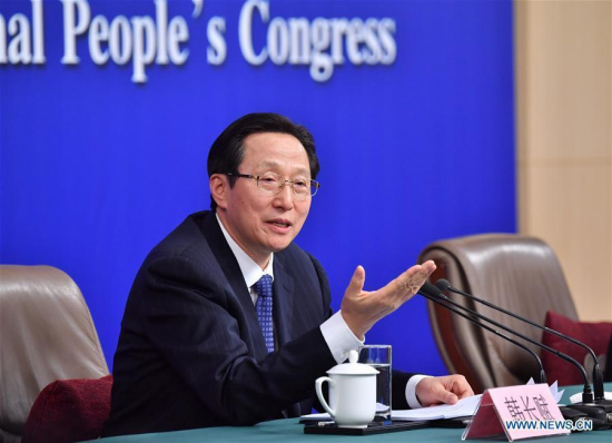 Chinese Minister of Agriculture Han Changfu answers questions at a press conference on implementation of the rural revitalization strategy and promotion of transformation and upgrading of agriculture during the first session of the 13th National People's Congress in Beijing, capital of China, March 7, 2018. (Xinhua/Li Xin)
