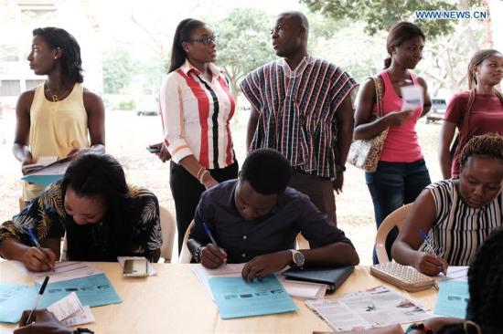 Ghanaian students fill out forms at the campus recruitment fair organized by the Confucius Institute of the University of Ghana in Ghana's capital Accra on Feb. 28, 2018. This year's fair opened at the University of Ghana on Wednesday. (Xinhua/Francis Kokoroko)