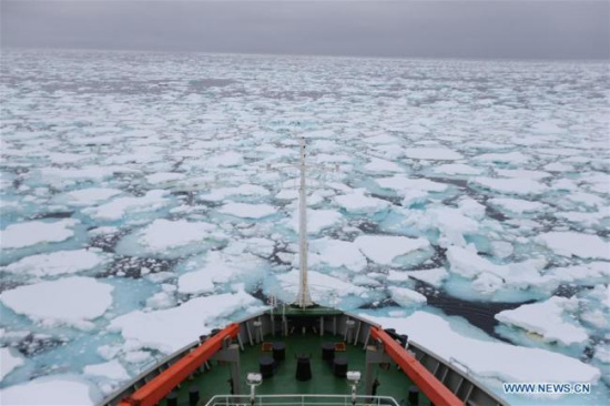 China's research icebreaker Xuelong, or Snow Dragon, sails against ice on its way to Zhongshan station in Antarctic, Dec. 20, 2017. (File photo/Xinhua)