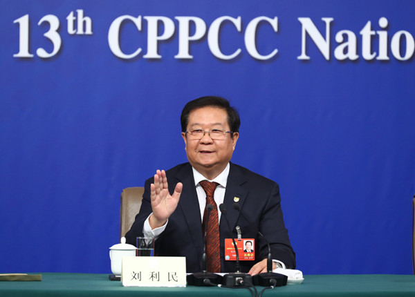 Liu Limin, former vice-minister of education answers questions at a news conference on the sidelines of the annual session of the National People's Congress in Beijing, March 10, 2018. (Photo/Xinhua)