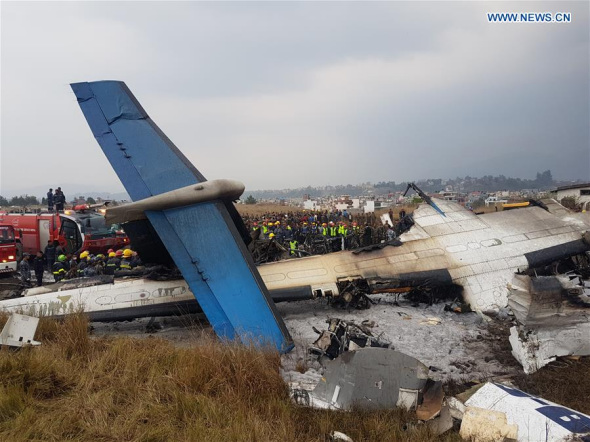 Photo taken on March 12, 2018 shows the crash-landing site in Kathmandu, Nepal. A passenger plane of the US-Bangla Airlines crashed at Nepal's Tribhuvan International Airport (TIA) on Monday, with dozens feared dead and at least 17 people injured. (Photo/Xinhua)