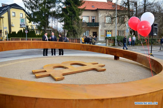 A sculpture devoted to blockchain technology is seen at a roundabout in downtown Kranj, Slovenia, on March 13, 2018. The first-ever sculpture in the world devoted to blockchain technology has been officially unveiled in downtown Kranj, Slovenia's fourth-largest city. (Xinhua/Matic Stojs)
