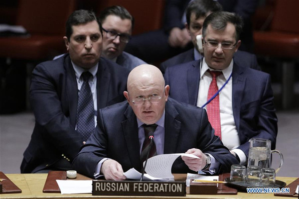 Russian Ambassador to the United Nations Vassily Nebenzia (Front) addresses a Security Council emergency meeting regarding accusations of the use of a nerve agent in the United Kingdom at the United Nations headquarters in New York, on March 14, 2018. Russian Ambassador to the United Nations Vassily Nebenzia said Wednesday that Britain's allegations that Moscow was responsible for a nerve attack were 