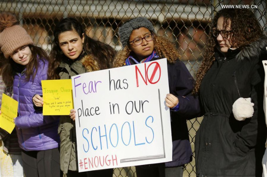 Students of Walter Payton College Preparatory High School protest against gun violence in Chicago, the United States, on March 14, 2018. (Xinhua/Wang Ping)