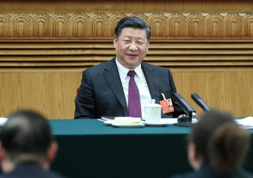Chinese President Xi Jinping, also general secretary of the Communist Party of China (CPC) Central Committee and chairman of the Central Military Commission, joins a panel discussion with the deputies from Inner Mongolia autonomous region at the first session of the 13th National People's Congress in Beijing, capital of China, March 5, 2018. (Photo/Xinhua)