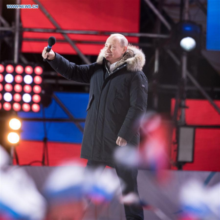 Incumbent Russian President Vladimir Putin gestures to people at an occasion in Moscow, Russia, on March 18, 2018. Incumbent Russian President Vladimir Putin was set to win his fourth term as he got 75.91 percent of the votes after 70 percent of the ballots were counted, preliminary data from the Central Election Commission (CEC) showed. (Xinhua/Wu Zhuang)