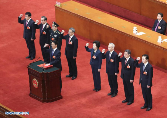 Vice premiers, state councilors and secretary-general of the State Council take oath of allegiance to the Constitution after the seventh plenary meeting of the first session of the 13th National People's Congress (NPC) at the Great Hall of the People in Beijing, capital of China, March 19, 2018. (Xinhua/Pang Xinglei)
