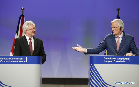 British Brexit Secretary David Davis (L) and European Union's chief Brexit negotiator Michel Barnier attend the press conference after a new round of negotiations on Brexit talks in Brussels, Belgium, March 19, 2018. (Xinhua/Ye Pingfan)