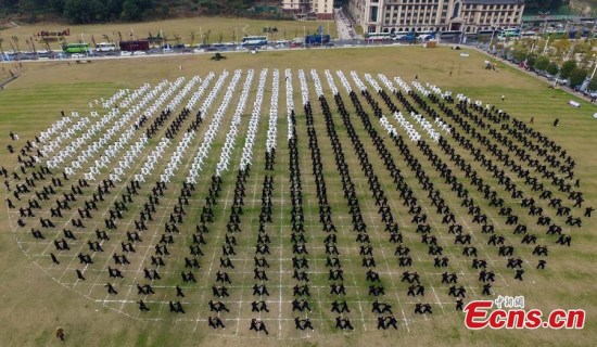 Over 2,000 people perform Tai Chi at the opening ceremony of the first Tai Chi Festival in Nanchang, capital city of Chinas Jiangxi Province on November 25, 2017. China Records confirmed that it was the largest Tai Chi performance ever staged in China. (Photo: China News Service/Liu Zhankun)