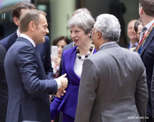 European Council President Donald Tusk (L, Front) talks with British Prime Minister Theresa May (C) and Portuguese Prime Minister Antonio Costa (R, Front) during the European Union (EU)'s spring summit at the EU headquarters in Brussels, Belgium, on March 22, 2018. (Xinhua/Thierry Monass)