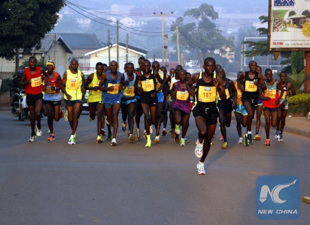 File photo shows participants take part in the 14th edition of MTN Kampala Marathon in Kampala, capital of Uganda, Nov. 19, 2017. (Xinhua/Joseph Kiggundu)