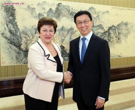 Chinese Vice Premier Han Zheng (R), also a member of the Standing Committee of the Political Bureau of the Communist Party of China (CPC) Central Committee, meets with World Bank Chief Executive Officer Kristalina Georgieva in Beijing, capital of China, March 26, 2018. (Xinhua/Liu Weibing)