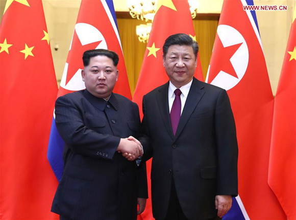 At the invitation of Xi Jinping, general secretary of the Central Committee of the Communist Party of China (CPC) and Chinese president, Kim Jong Un, chairman of the Workers' Party of Korea (WPK) and chairman of the State Affairs Commission of the Democratic People's Republic of Korea (DPRK), paid an unofficial visit to China from March 25 to 28. During the visit, Xi held talks with Kim at the Great Hall of the People in Beijing. Xi held a welcoming ceremony for Kim before their talks. (Xinhua/Ju Peng)