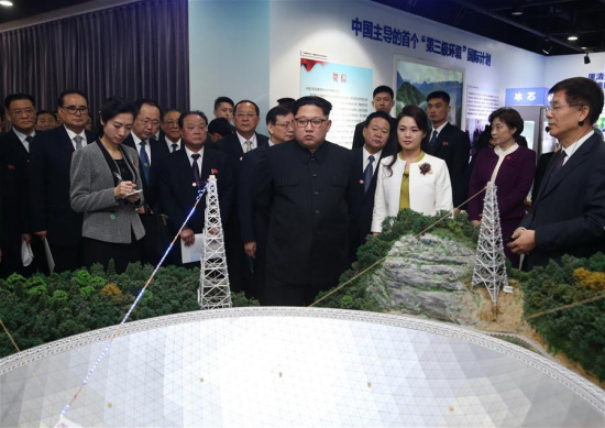 Kim Jong Un, chairman of the Workers' Party of Korea (WPK) and chairman of the State Affairs Commission of the Democratic People's Republic of Korea (DPRK), visits an exhibition showcasing the innovation achievements of the Chinese Academy of Sciences since the 18th National Congress of the Communist Party of China (CPC). (Xinhua/Yao Dawei)