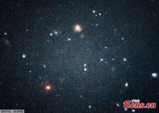 An image of galaxy NGC 1052-DF2 taken by the Hubble space telescope. (Photo/Agencies)