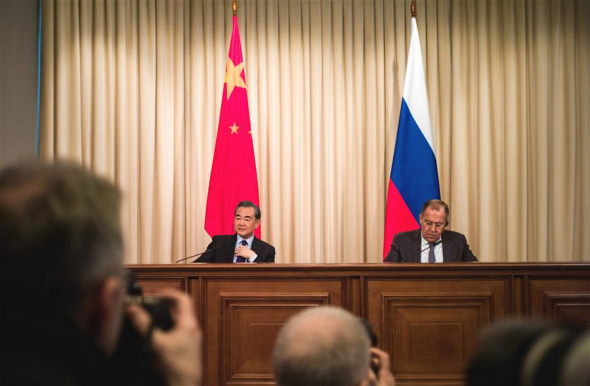 Chinese President Xi Jinping's special envoy, State Councilor and Foreign Minister Wang Yi (L) and Russian Foreign Minister Sergei Lavrov attend a press conference after their talks in Moscow, Russia, on April 5, 2018. (Xinhua/Wu Zhuang)