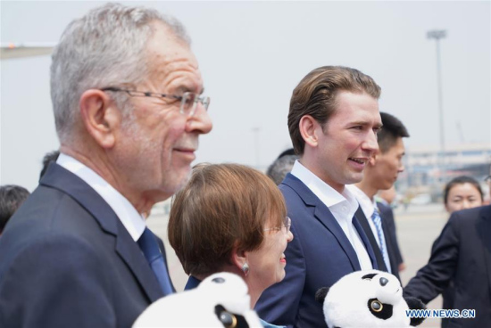 Austrian President Alexander Van der Bellen (L) and his wife Doris Schmidauer (C), together with Austrian Chancellor Sebastian Kurz (R), arrive in Chengdu, capital of southwest China's Sichuan Province, April 11, 2018. (Xinhua/Wang Di)