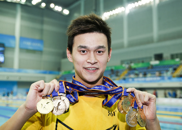 World and Olympic champion Sun Yang, displaying the six gold medals and one silver he won at the China National Games last September in Tianjin, is the one to watch when the China National Swimming Championships open on Friday in Taiyuan. (Photo/Xinhua)