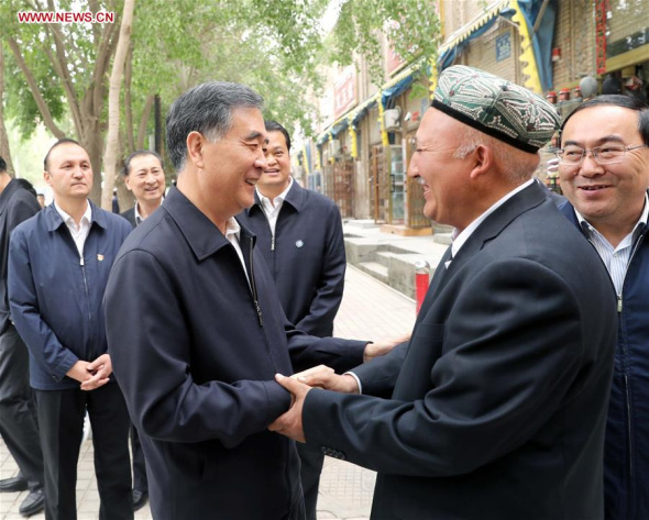 Wang Yang, chairman of the National Committee of Chinese People's Political Consultative Conference, also a member of the Standing Committee of the Political Bureau of the Communist Party of China Central Committee, visits a mosque in Hotan City, northwest China's Xinjiang Uygur Autonomous Region, April 10, 2018. Wang made an inspection tour in Xinjiang from April 10 to 14. (Xinhua/Liu Weibing)