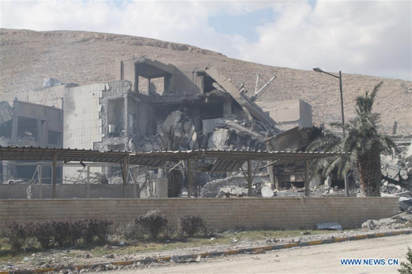 Photo taken on April 14, 2018 shows relics of the Scientific Research Center in the Barzeh neigborhood of northeast of Damascus, after United States, Britain and France carried out a wave of joint airstrikes on Syrian military facilities. The U.S., along with its allies Britain and France, launched missile strikes on Syrian military positions earlier on Saturday. (Xinhua/Monsef Memari)