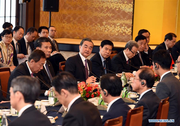 Chinese State Councilor and Foreign Minister Wang Yi attends the high-level economic dialogue between China and Japan in Tokyo, Japan, on April 16, 2018. Wang Yi on Monday co-chaired the fourth high-level economic dialogue between China and Japan with Japanese Foreign Minister Taro Kono here. (Xinhua/Ma Ping)