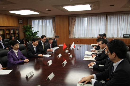 Chinese Minister of Commerce Zhong Shan meets with Japanese Minister of Economy, Trade and Industry Hiroshige Seko in Tokyo, Japan, on April 15, 2018. (Xinhua)
