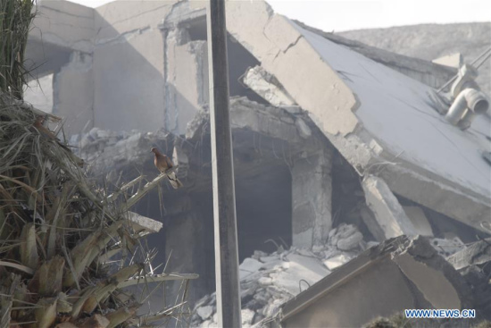 Photo taken on April 14, 2018 shows relics of the Scientific Research Center in the Barzeh neigborhood of northeast of Damascus, after United States, Britain and France carried out a wave of joint airstrikes on Syrian military facilities. The U.S., along with its allies Britain and France, launched missile strikes on Syrian military positions earlier on Saturday. (Xinhua/Monsef Memari)