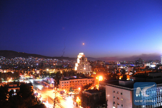 Surface-to-air missiles were seen in the sky over Syria's capital Damascus on April 14, 2018, as the Syrian air defenses were responding to the U.S.-led missile attack on Syria. (Xinhua/Ammar Safarjalani)