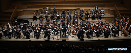 Artists of Hangzhou Philharmonic Orchestra (HPO) perform at the Athens Concert Hall in Athens, Greece, on April 16, 2018. The Chinese orchestra performed at the Athens Concert Hall as part of the Greece-China Year of Cultural Exchange and Cultural Industry Cooperation, which started last spring. (Xinhua/Marios Lolos)