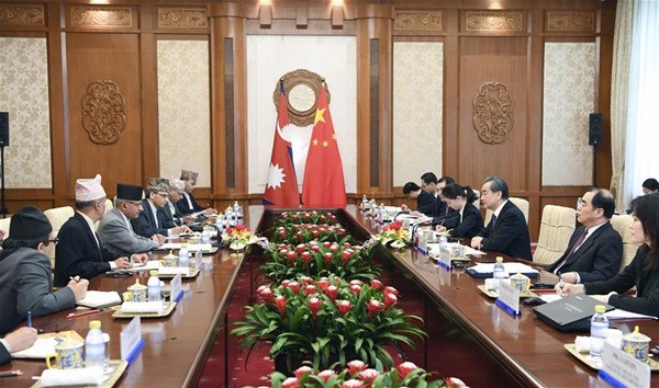 Chinese State Councilor and Foreign Minister Wang Yi holds talks with Nepal Foreign Minister Pradeep Kumar Gyawali in Beijing, capital of China, April 18, 2018. (Xinhua/Zhang Ling)